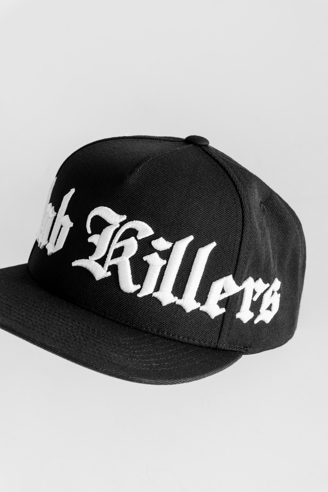 SITTING SIDEWAYS JUMBO LOGO - BLACK SNAPBACK WITH WHITE LOGO