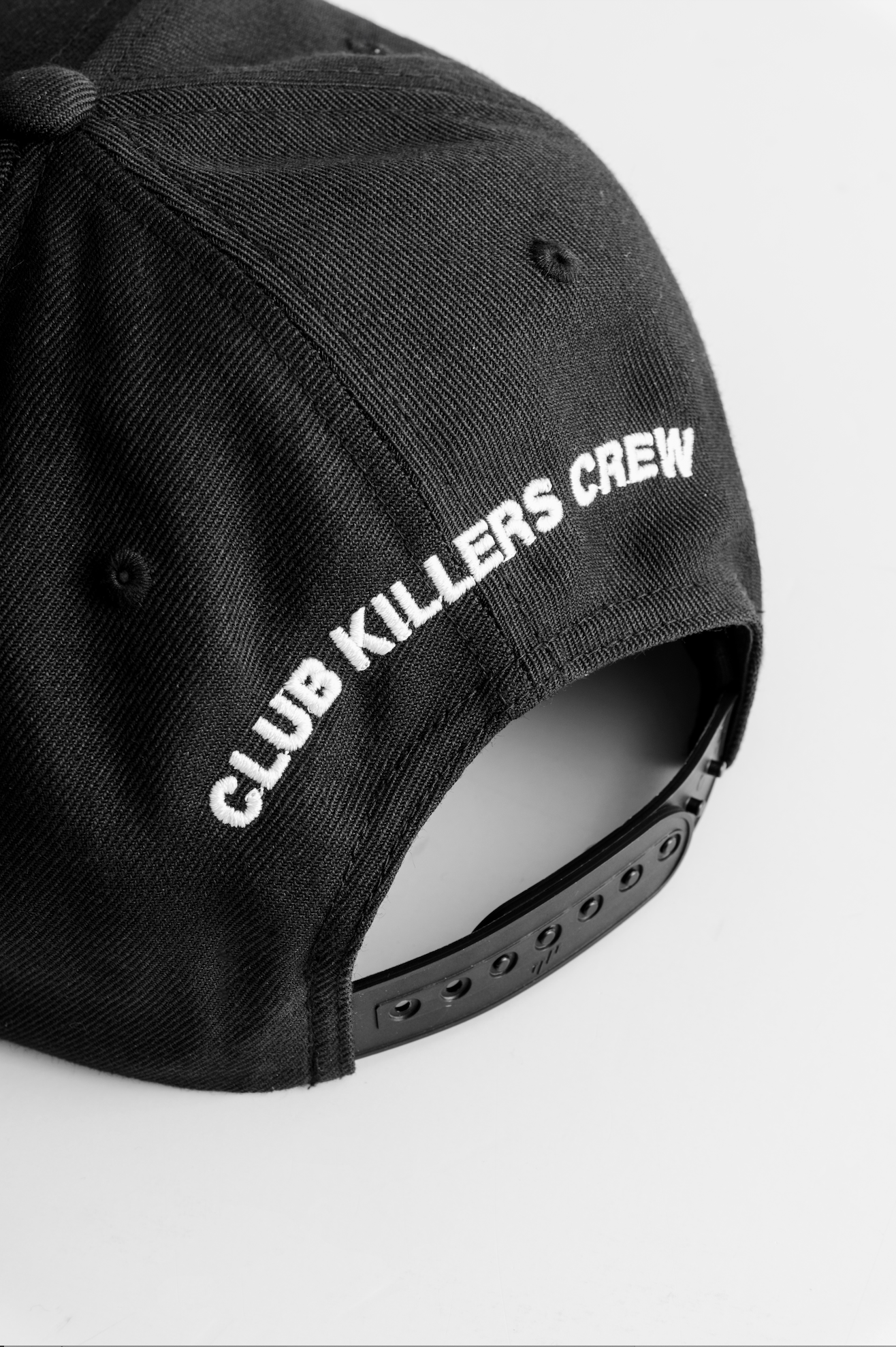 SITTING SIDEWAYS JUMBO LOGO - BLACK SNAPBACK WITH WHITE LOGO