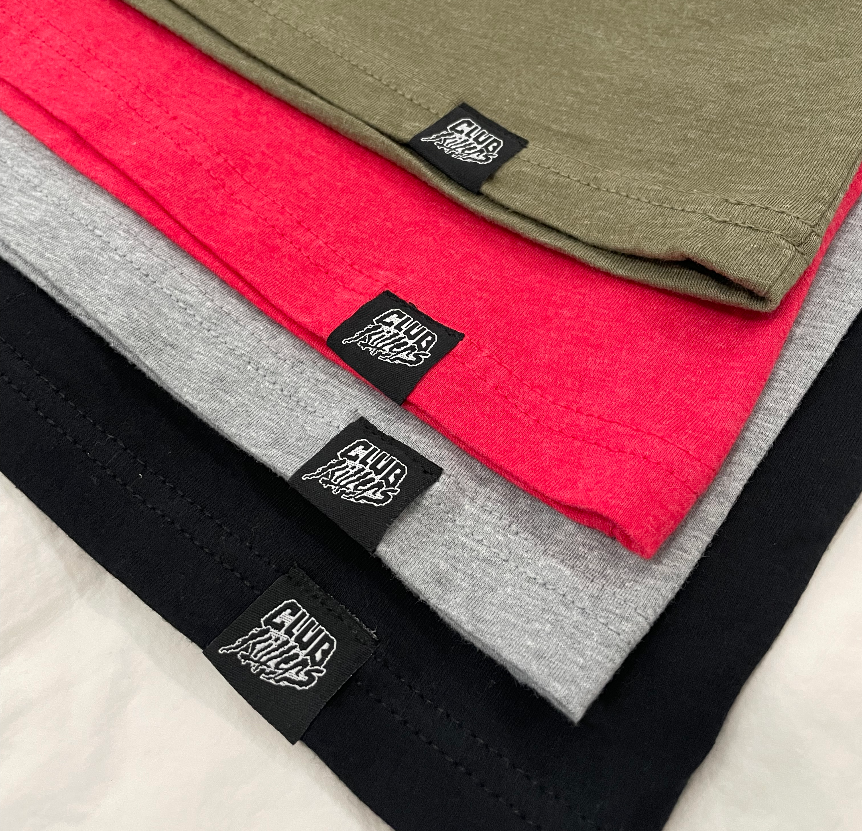 Club Killers Logo Tag on bottom left tee